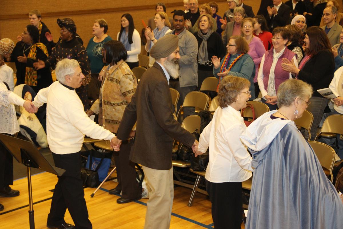 Dancing to singing led by Dr. Joan Hillsman